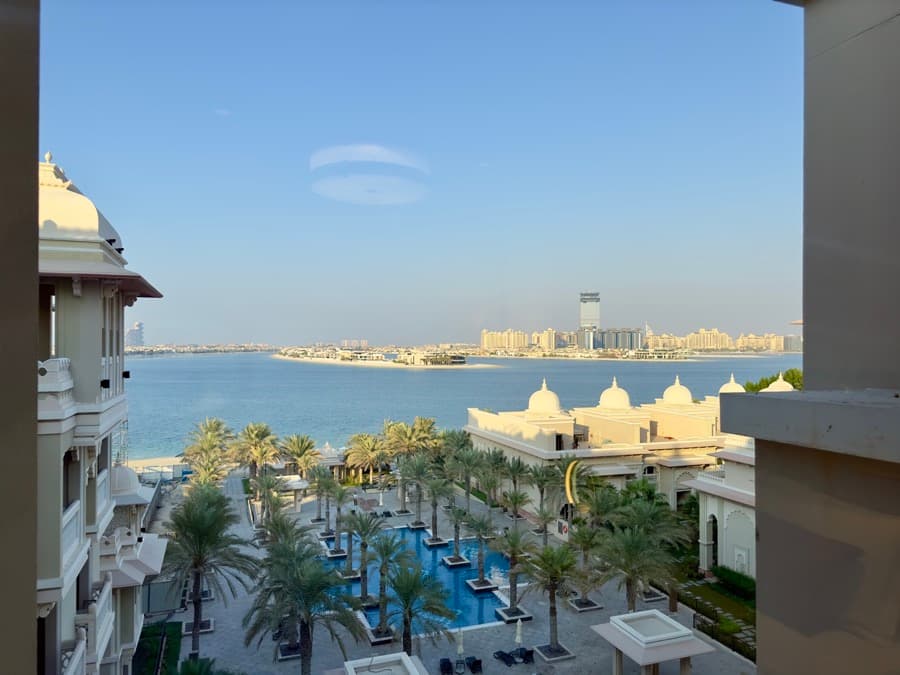 Taj residences balcony view with palm courtyard and sea